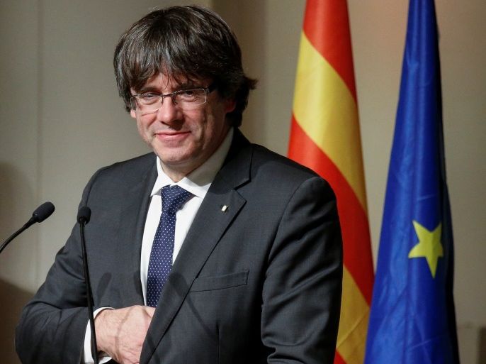 Former Catalan leader Carles Puigdemont gestures before delivering a speech to Catalan mayors in Brussels, Belgium, November 7, 2017. REUTERS/Pascal Rossignol