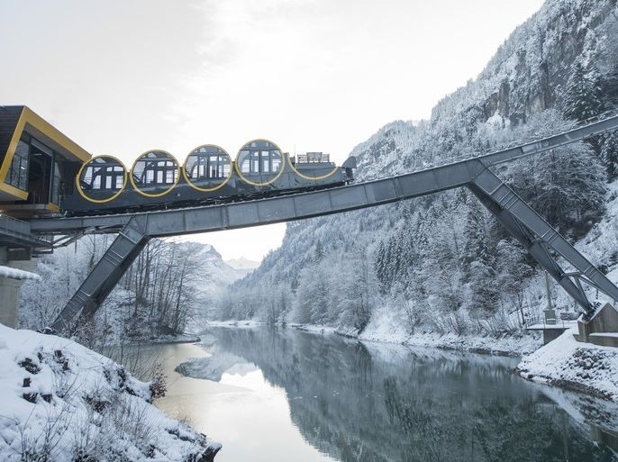 epa06390822 The new and steepest funicular railway in the world, the Stoos Bahn, is ready for the opening ceremony after five years of construction, in Stoos, Switzerland, 15 December 2017. EPA-EFE/URS FLUEELER