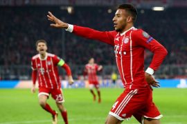 MUNICH, GERMANY - DECEMBER 05: Corentin Tolisso of Bayern Muenchen celebrates after scoring his sides third goal during the UEFA Champions League group B match between Bayern Muenchen and Paris Saint-Germain at Allianz Arena on December 5, 2017 in Munich, Germany. (Photo by Alexander Hassenstein/Bongarts/Getty Images)