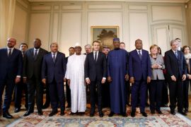 From L, Belgian Prime Minister Charles Michel, President of Burkina Faso Roch Marc Christian Kabore, Mauritania's President Mohamed Ould Abdel Aziz, Mali’s President Ibrahim Boubacar Keita, French President Emmanuel Macron, Chad's President Idriss Deby, Niger's President Mahamadou Issoufou, German Chancellor Angela Merkel and Italy's Prime Minister Paolo Gentiloni pose for a group photo during a conference to discuss how to speed up the implementation of the G5 West African counter-terrorism force, in La Celle Saint-Cloud, near Paris, France, December 13, 2017. REUTERS/Michel Euler/Pool