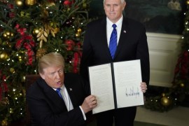 blogs - U.S. President Donald Trump shows off an executive order recognizing Jerusalem as the capital of Israel after signing it with Vice President Mike Pence at his side in the Diplomatic Reception Room of the White House in Washington, U.S., December 6, 2017. REUTERS/Jonathan Ernst