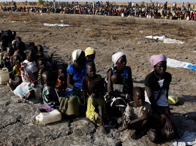 Women and children wait to be registered prior to a food distribution carried out by the United Nations World Food Programme (WFP) in Thonyor, Leer state, South Sudan, February 26, 2017. REUTERS/Siegfried Modola