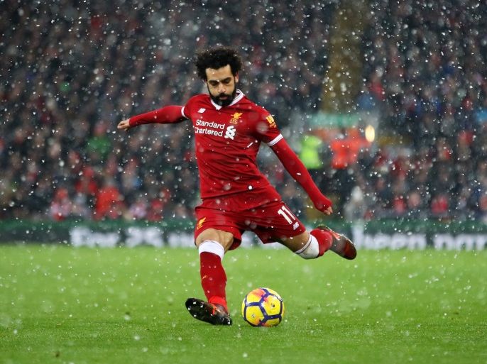 LIVERPOOL, ENGLAND - DECEMBER 10: Mohamed Salah of Liverpool takes a shot during the Premier League match between Liverpool and Everton at Anfield on December 10, 2017 in Liverpool, England. (Photo by Clive Brunskill/Getty Images)