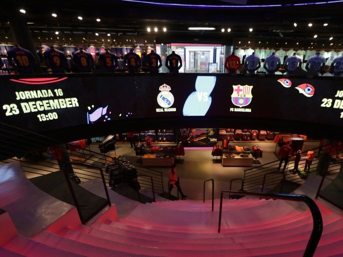 A sign at Barcelona Football Club store advertises the upcoming