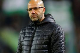 Soccer Football - Bundesliga - Borussia Dortmund vs Werder Bremen - Signal Iduna Park, Dortmund, Germany - December 9, 2017 Borussia Dortmund coach Peter Bosz looks dejected at the end of the match REUTERS/Thilo Schmuelgen DFL RULES TO LIMIT THE ONLINE USAGE DURING MATCH TIME TO 15 PICTURES PER GAME. IMAGE SEQUENCES TO SIMULATE VIDEO IS NOT ALLOWED AT ANY TIME. FOR FURTHER QUERIES PLEASE CONTACT DFL DIRECTLY AT + 49 69 650050