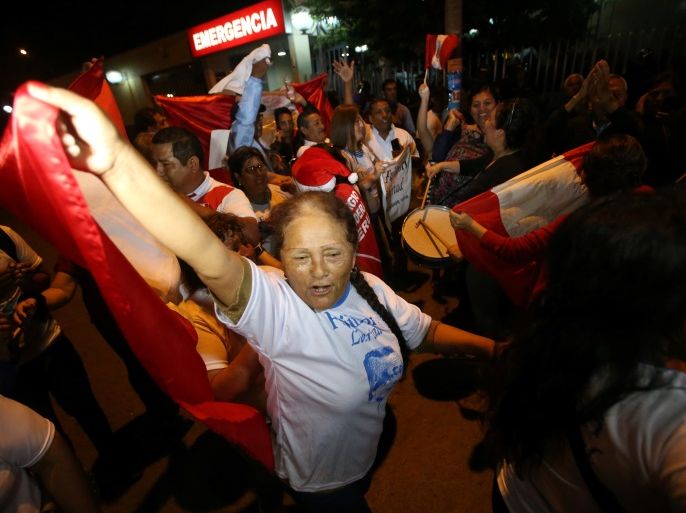 Supporters celebrate after Peruvian President Pedro Pablo Kuczynski pardoned former President Alberto Fujimori who was serving a 25-year prison sentence, outside Centenario hospital in Lima, Peru, December 24, 2017. REUTERS/Guadalupe Pardo