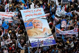 Supporters of Yemen's former President Ali Abdullah Saleh carry his poster during a rally to mark the 35th anniversary of the establishment of the General People's Congress party which is led by Saleh in Sanaa, Yemen August 24, 2017. The poster reads: