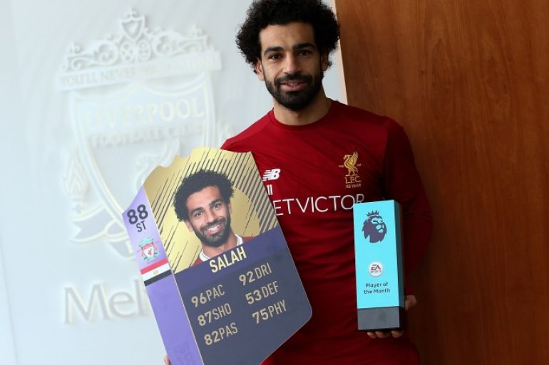 LIVERPOOL, ENGLAND - DECEMBER 14: Mohamed Salah is Awarded the EA SPORTS Player of the Month for November at Melwood Training Ground on December 14, 2017 in Liverpool, England. (Photo by Jan Kruger/Getty Images for Premier League)