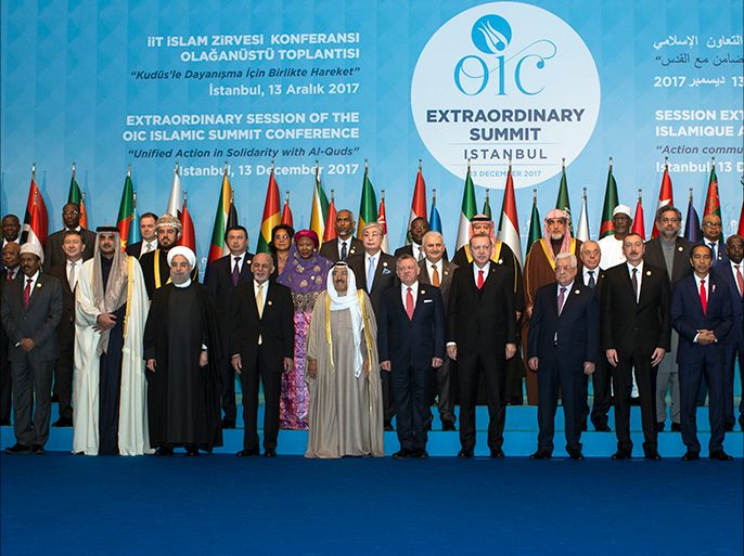 epa06386424 Turkish President Recep Tayyip Erdogan poses with other participants for a family photo session at the extraordinary summit of the Organisation of Islamic Cooperation (OIC) in Istanbul, Turkey, 13 December 2017. Leaders of OIC gather in Istanbul after US president Donald J. Trump on 06 December announced he is recognising Jerusalem as the Israel capital and will relocate the US embassy from Tel Aviv to Jerusalem. EPA-EFE/SEDAT SUNA
