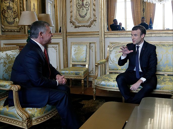 epa06398650 French President Emmanuel Macron (R) meets Jordan's King Abdullah II (L) at the Elysee Palace in Paris, France, 19 December 2017. EPA-EFE/YOAN VALAT / POOL MAXPPP OUT