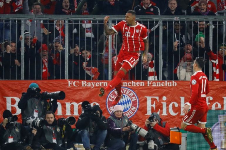 Soccer Football - DFB Cup Third Round - Bayern Munich vs Borussia Dortmund - Allianz Arena, Munich, Germany - December 20, 2017 Bayern Munich's Jerome Boateng celebrates scoring their first goal REUTERS/Kai Pfaffenbach DFB RULES PROHIBIT USE IN MMS SERVICES VIA HANDHELD DEVICES UNTIL TWO HOURS AFTER A MATCH AND ANY USAGE ON INTERNET OR ONLINE MEDIA SIMULATING VIDEO FOOTAGE DURING THE MATCH.
