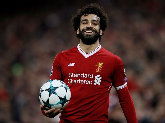 Soccer Football - Champions League - Liverpool vs Spartak Moscow - Anfield, Liverpool, Britain - December 6, 2017 Liverpool's Mohamed Salah celebrates after the match REUTERS/Phil Noble