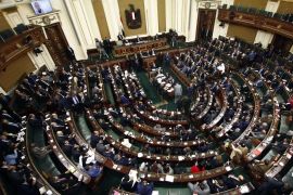 epa05095385 A general view showing members of the new Egyptian Parliament meeting during their inaugural session in Cairo,, Egypt, 10 January 2016. Egypt's first parliament in more than three years held its opening session on 10 January 2016 after a court dissolved the previous legislature dominated by Islamists. The 596 deputies in the parliament, which is heavily dominated by supporters of President Abdel-Fattah al-Sissi, will swear an oath of loyalty to the constitu
