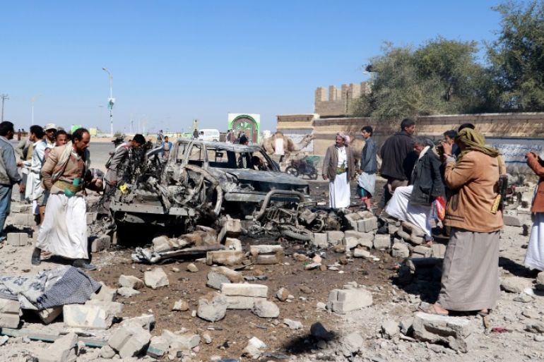 People inspect damage at the site of air strikes in the northwestern city of Saada, Yemen December 20, 2017. REUTERS/Naif Rahma