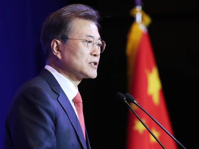 epa06386252 South Korean President Moon Jae-in gives remarks to Korean expatriates during a luncheon in Beijing, China, 13 December 2017. Moon arrived in the Chinese capital earlier in the day for a four-day state visit. Moon called for a new start in relations between the two countries, cementing ties in political and security issues that have fallen behind those in the economic sector. EPA-EFE/YONHAP SOUTH KOREA OUT