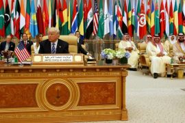 U.S. President Donald Trump takes his seat before his speech to the Arab Islamic American Summit in Riyadh, Saudi Arabia May 21, 2017. REUTERS/Jonathan Ernst