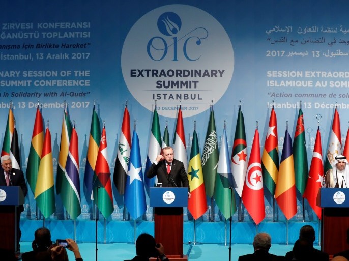 Secretary General of Organisation of Islamic Cooperation (OIC) Yousef bin Ahmad Al-Othaimeen, Turkish President Tayyip Erdogan and Palestinian President Mahmoud Abbas attend a news conference following the extraordinary meeting of the OIC in Istanbul, Turkey, December 13, 2017. REUTERS/Osman Orsal