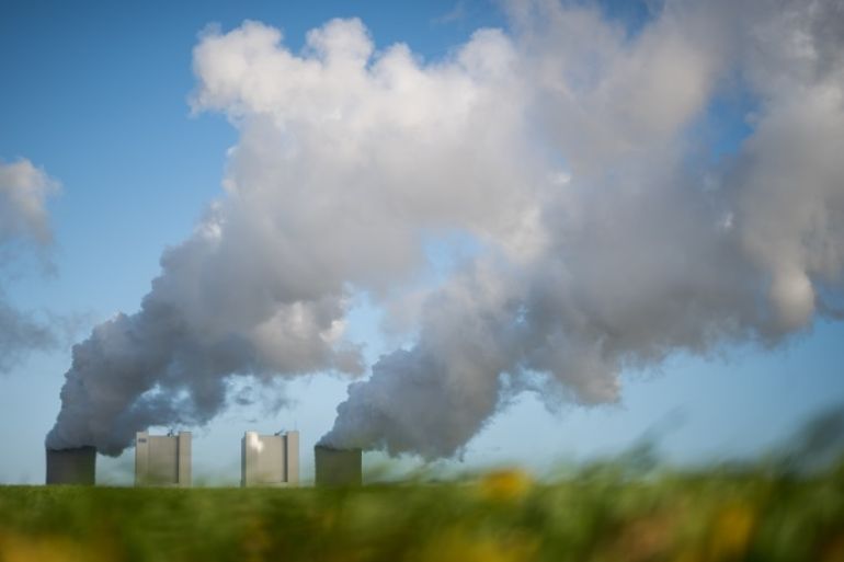 BERHEIM, GERMANY - NOVEMBER 13: Steam rises from the Neurath coal-fired power plant operated by German utility RWE, which stands near open-pit coal mines that feed it with coal, on November 13, 2017 near Bergheim, Germany. The COP 23 United Nations Climate Change Conference is taking place in Bonn, about 60km from the Niederaussem plant. The nearby Rhineland coal fields are the biggest source of coal in western Germany and the power plants in the region that they supply