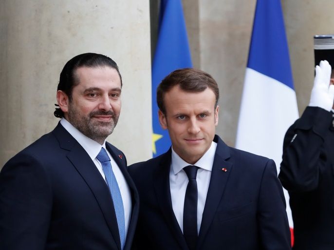 French President Emmanuel Macron and Saad al-Hariri, who announced his resignation as Lebanon's prime minister while on a visit to Saudi Arabia, are pictured at the Elysee Palace in Paris, France, November 18, 2017. REUTERS/Gonzalo Fuentes