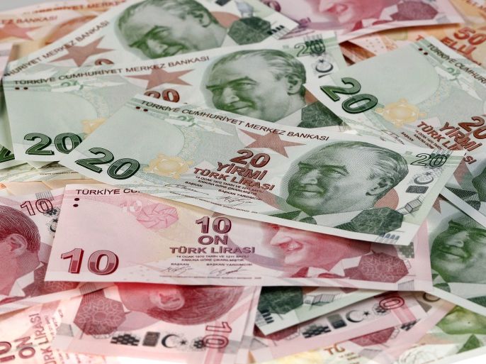 Turkish Lira banknotes are seen in this October 10, 2017 picture illustration. REUTERS/Murad Sezer/Illustration