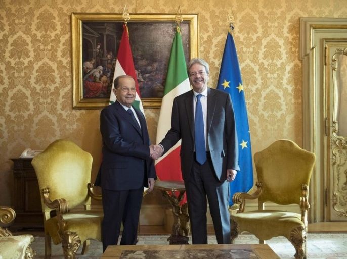 epa06360917 A handout photo made available by the Chigi Palace Press Office shows Italian Prime Minister Paolo Gentiloni (R) shaking hands with Lebanese President Michel Aoun (L) during their meeting at Chigi Palace in Rome, Italy, 01 December 2017. Aoun is in Italy on a three-day official. EPA-EFE/CHIGI PALACE PRESS OFFICE/TIBERIO BARCHIELLI HANDOUT HANDOUT EDITORIAL USE ONLY/NO SALES