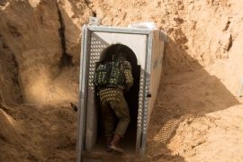 An Israeli soldier enters what the Israeli military say is a cross-border attack tunnel dug from Gaza to Israel, on the Israeli side of the Gaza Strip border near Kissufim January 18, 2018. REUTERS/Jack Guez/Pool