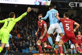 MANCHESTER, ENGLAND - JANUARY 09: Sergio Aguero of Manchester City (10) scores their second goal past Frank Fielding of Bristol City during the Carabao Cup Semi-Final First Leg match between Manchester City and Bristol City at Etihad Stadium on January 9, 2018 in Manchester, England. (Photo by Gareth Copley/Getty Images)