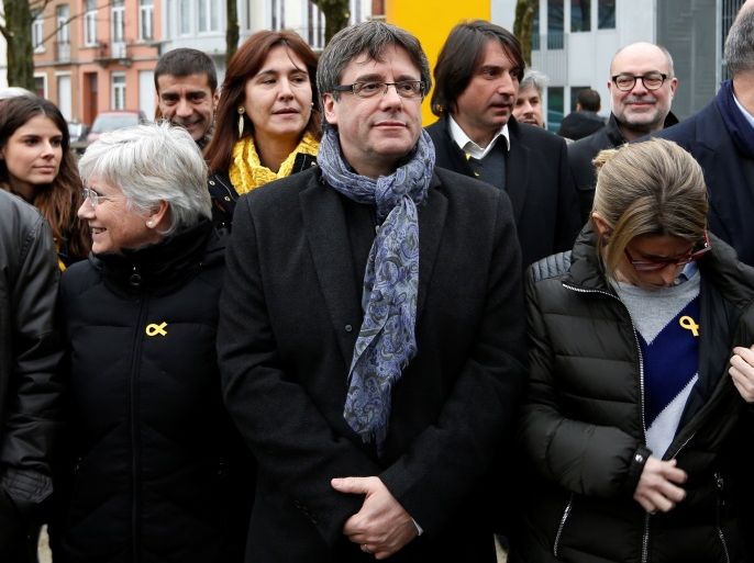 Former Catalan leader Carles Puigdemont poses with members of his party 'Junts per Catalunya' parliament group in Brussels, Belgium January 12, 2018. REUTERS/Francois Lenoir