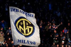 Soccer Football - Serie A - Inter Milan vs Udinese - San Siro, Milan, Italy - December 16, 2017 Inter Milan fans wave a flag REUTERS/Alessandro Garofalo