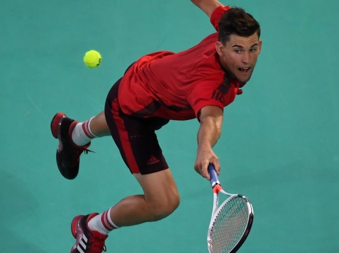 epa06409442 Austria's Dominic Thiem in action against Kevin Anderson of South Africa during their semi final match of the World Tennis Championship in Abu Dhabi, UAE, 29 December 2017. EPA-EFE/MARTIN DOKOUPIL
