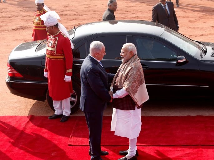 Israeli Prime Minister Benjamin Netanyahu shakes hands with his Indian counterpart Narendra Modi at his ceremonial reception in New Delhi, India, January 15, 2018. REUTERS/Adnan Abidi