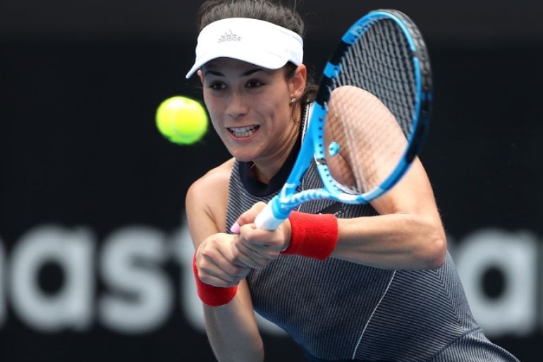 SYDNEY, AUSTRALIA - JANUARY 10: Garbine Muguruza of Spain plays a backhand in her second round match against Kiki Bertens of Netherlands during day four of the 2018 Sydney International at Sydney Olympic Park Tennis Centre on January 10, 2018 in Sydney, Australia. (Photo by Mark Metcalfe/Getty Images)