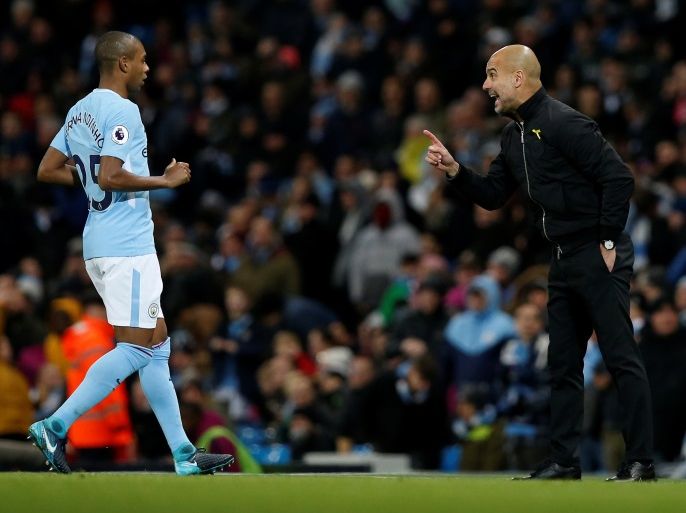 Soccer Football - Premier League - Manchester City vs Southampton - Etihad Stadium, Manchester, Britain - November 29, 2017 Manchester City manager Pep Guardiola speaks with Fernandinho REUTERS/Andrew Yates EDITORIAL USE ONLY. No use with unauthorized audio, video, data, fixture lists, club/league logos or