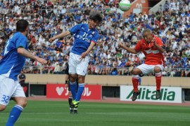 TOKYO, JAPAN - JUNE 09: Kazuyoshi Miura #11 in action during the J.League Legend and Glorie Azzurre match at the National Stadium on June 9, 2013 in Tokyo, Japan. (Photo by Masashi Hara/Getty Images)