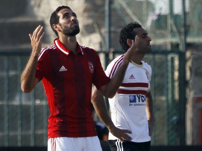 Al-Ahly's Mohamed Aboutrika (L) celebrates after scoring a goal against Zamalek during their CAF Champions League soccer match at El-Gouna stadium in Hurghada, about 464 km (288 miles) from the capital Cairo September 15, 2013. REUTERS/Amr Abdallah Dalsh (EGYPT - Tags: SPORT SOCCER)