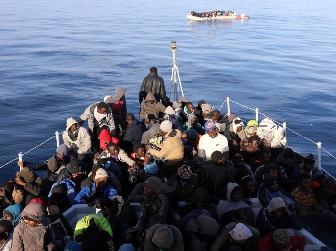 Migrants are seen as they are rescued by Libyan coast guards in the Mediterranean Sea off the coast of Libya, January 15, 2018. Picture taken January 15, 2018. REUTERS/Hani Amara