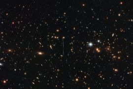 Hubble Weighs in on Mass of Three Million Billion Suns (NASA)