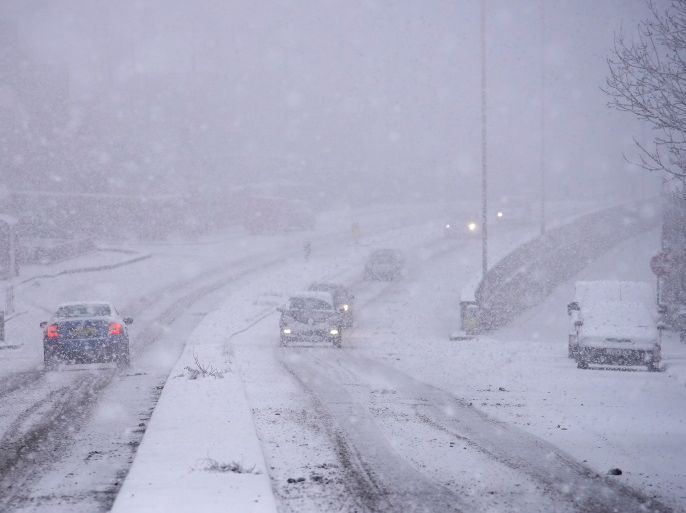 HUDDERSFIELD, ENGLAND - DECEMBER 29: Heavy snow makes driving conditions treacherous on December 29, 2017 in Huddersfield, England. Travellers are being warned of dangerous roads conditions across the UK, as wintry weather brings snow and ice and an amber warning from the MET Office.(Photo by Christopher Furlong/Getty Images)