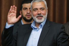 FILE PHOTO: Senior Hamas leader Ismail Haniyeh waves as he arrives to deliver a farewell speech for his former position as a Hamas government Prime Minister, in Gaza City June 2, 2014. REUTERS/Suhaib Salem/File Photo