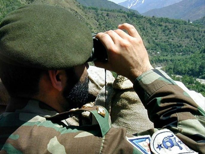resize A Pakistani soldier keeps watch over to the Indian army positions at the disputed frontier between two countries also know as Line of Control (LOC) in the Chakothi sector, Muzaffarabad, Kashmir on 5 May 2003 . Kashmir is a land of dispute between Pakistan and India. The international community fears that the dispute between India and Pakistan could lead to nuclear confrontation, and has pressed the two to hold peace talks. Both countries have nuclear arsenals and