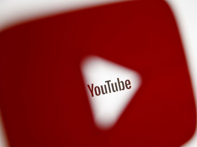 A 3D-printed YouTube icon is seen in front of a displayed YouTube logo in this illustration taken October 25, 2017. REUTERS/Dado Ruvic/Ilustration