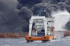 A rescue ship works to extinguish the fire on the burning Iranian oil tanker Sanchi in the East China Sea, in this January 12, 2018 picture provided by Shanghai Maritime Search and Rescue Centre and released by China Daily. China Daily via REUTERS ATTENTION EDITORS - THIS PICTURE WAS PROVIDED BY A THIRD PARTY. CHINA OUT.