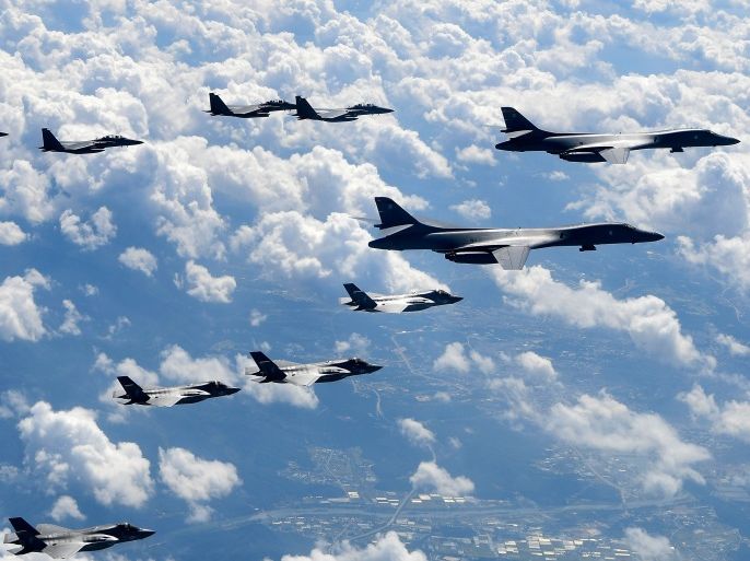 GANGWON-DO, SOUTH KOREA - SEPTEMBER 18: In this handout image provided by South Korean Defense Ministry, U.S. Air Force B-1B Lancer bombers flying with F-35B fighter jets and South Korean Air Force F-15K fighter jets during a training at the Pilsung Firing Range on September 18, 2017 in Gangwon-do, South Korea. U.S. F-35B stealth jets and B-1B bombers flew near the Military Demarcation Line (MDL) for the first time since recent tension between U.S. and North Korea star