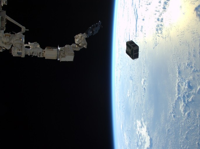 The robotic arm in Japan's Kibo laboratory successfully deploys two combined satellites from Texas universities from the International Space Station, January 29, 2016. The pair of satellites -- AggieSat4 built by Texas A&M University students, and BEVO-2 built by University of Texas students -- together form the Low Earth Orbiting Navigation Experiment for Spacecraft Testing Autonomous Rendezvous and Docking (LONESTAR) investigation. REUTERS/NASA/Tim Peake/Handout
