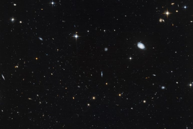 Astronomers used the NASA/ESA Hubble Space Telescope to unmask the dim, star-starved dwarf galaxy Leo IV. This Hubble image released on July 10, 2012, demonstrates why astronomers had a tough time spotting this small-fry galaxy: it is practically invisible. The image shows how the handful of stars from the sparse galaxy are virtually indistinguishable from the background. Residing 500 000 light-years from Earth, Leo IV is one of more than a dozen ultra-faint dwarf galax