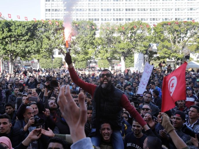 People shout slogans during demonstrations on the seventh anniversary of the toppling of president Zine El-Abidine Ben Ali, in Tunis, Tunisia January 14, 2018. REUTERS/Youssef Boudlal