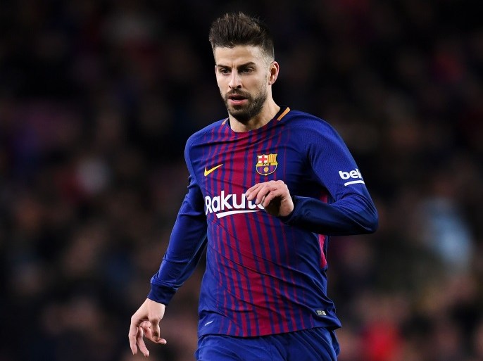 BARCELONA, SPAIN - JANUARY 11: Gerard Pique of FC Barcelona runs with the ball during the Copa del Rey round of 16 second leg match between FC Barcelona and Celta de Vigo at Camp Nou on January 11, 2018 in Barcelona, Spain. (Photo by David Ramos/Getty Images)