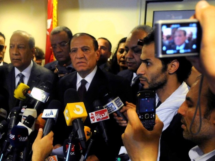 epa04123512 Egyptian former chief of staff General Sami Anan (C) speaks during a press conference at his office in Cairo, Egypt, 13 March 2014. Anan announced that he will not run in the upcoming presidential elections in Egypt. Army chief Abdul Fatah al-Sisi is widely expected to run for president. EPA/NAMEER GALAL/ALMASRY ALYOUM EGYPT OUT