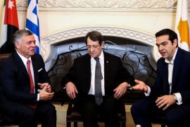 Cypriot President Nicos Anastasiades (C), Greek Prime Minister Alexis Tsipras (R) and Jordan's King Abdullah talk during a meeting at the Presidential Palace in Nicosia, Cyprus January 16, 2018. REUTERS/Iakovos Hatzistavrou/Pool