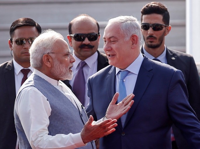 Israeli Prime Minister Benjamin Netanyahu is welcomed by his Indian counterpart Narendra Modi upon his arrival at Air Force Station Palam in New Delhi, India, January 14, 2018. REUTERS/Adnan Abidi